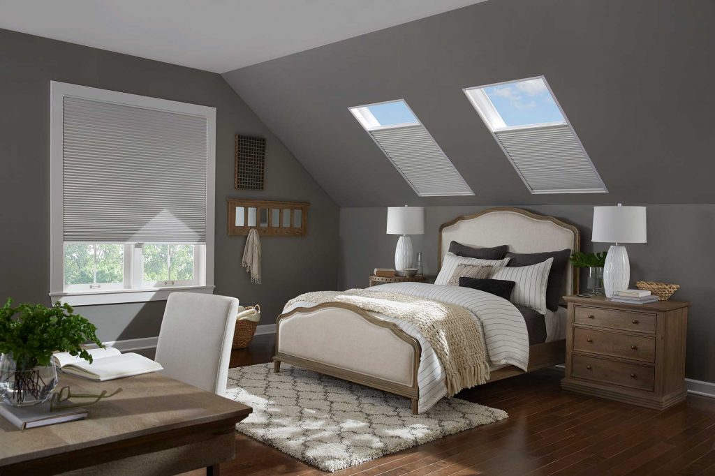 Honeycomb Shades by Alta Window Fashions in a large window and two skylights.